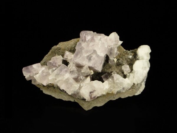 Ce sont des cristaux de fluorite de Durfort dans le Gard, c'est une pièce pour collectionneur de minéraux.