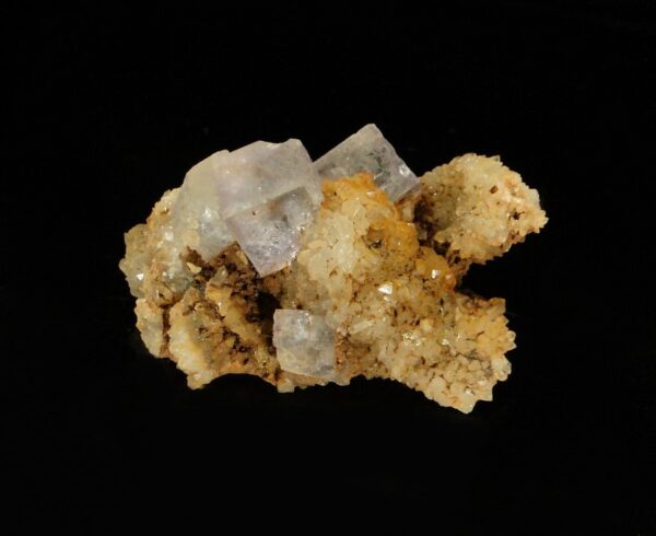 Ce sont des cristaux de fluorite sur quartz, c'est une pièce pour collectionneur de minéraux.